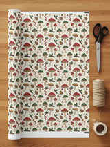Festive forest mushrooms and pine wrapping paper