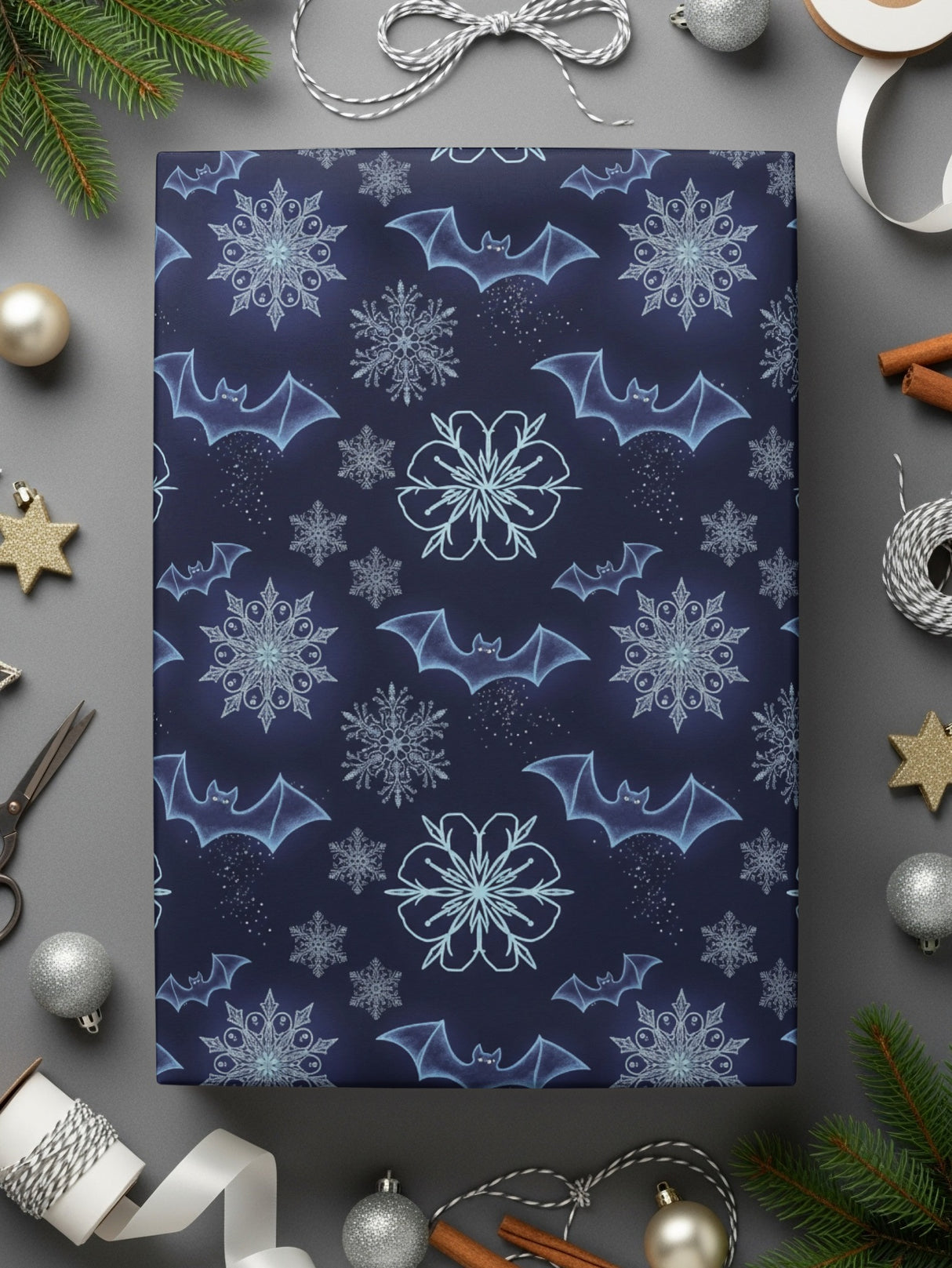 Festive blue wrapping paper with snowflakes and bats