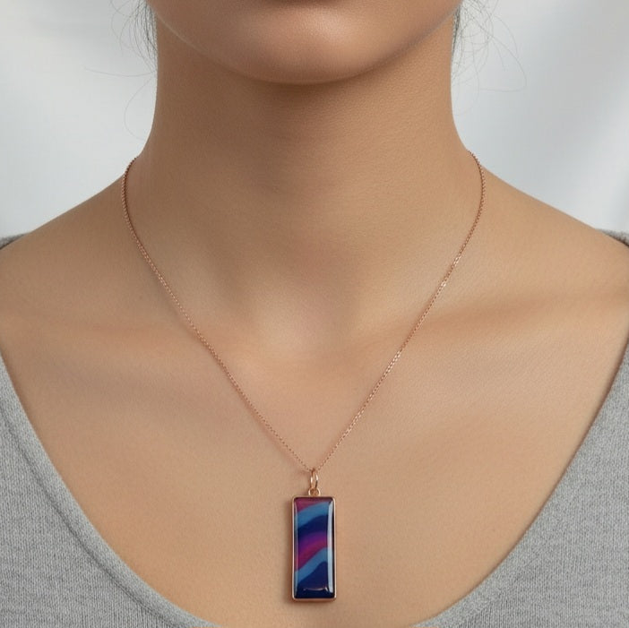 Necklace with a colorful pendant on a woman