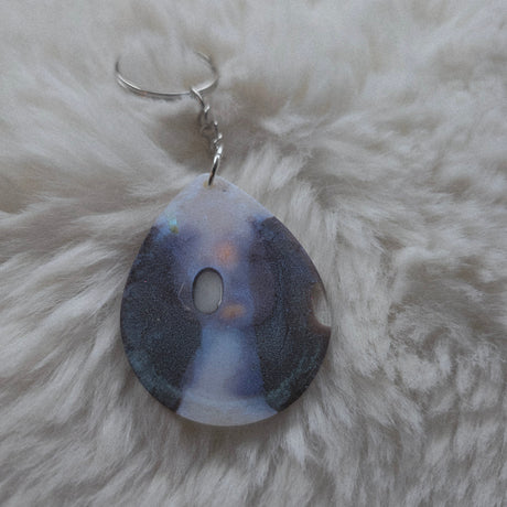 Back of creepy baby keychain